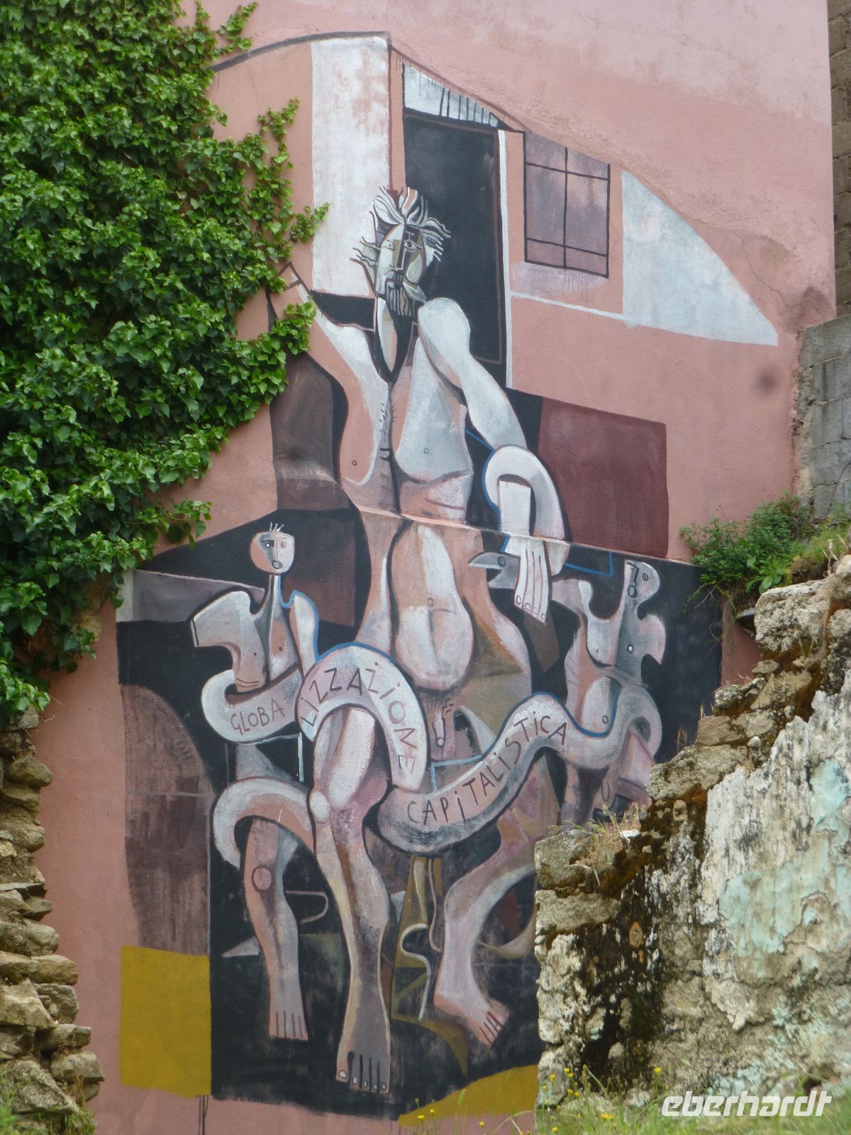 Die Laokoon-Gruppe neu interpretiert. Die Schlangen heißen Globalisierung und Kapitalismus.