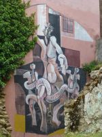 Die Laokoon-Gruppe neu interpretiert. Die Schlangen heißen Globalisierung und Kapitalismus.