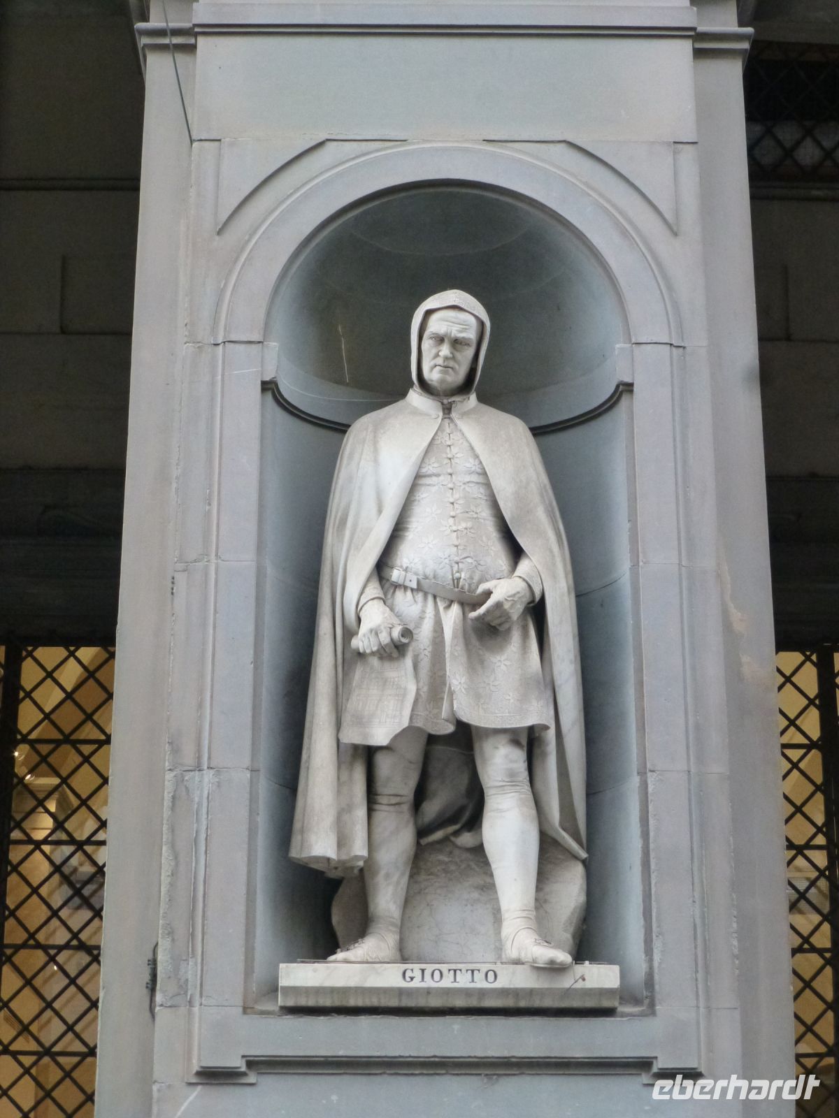 Giotto, der Meister des Glockenturms ziert neben weiteren Künstlern die Uffizien.