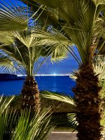 Abendstimmung - Blick auf das beleuchtete Alghero