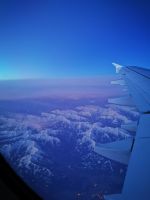 Tag 10 19.03.2023 Rückflug, Morgenröte über den Alpen 