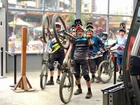 Downhill biker going uphill