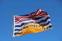 Flagge von British Columbia mit Union Jack und aufgehender Sonne