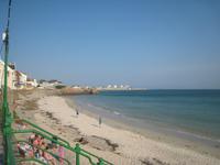 Strand am Hotel Ommaroo bei Flut