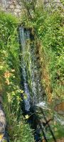 kleiner Wasserfall am Strand