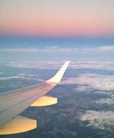 Letzte Etappe der Heimreise- ein Flug in den Sonnenuntergang