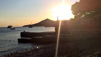 Sonnenuntergang vom Strand aus in Mlini