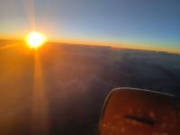 Sonnenaufgang über den Wolken