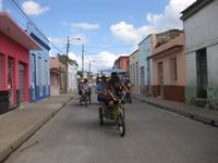 per Bici-Taxi in den Straßen von Camagüey