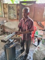 Kuala Kangsar - traditionelle Handwerkskunst (Herstellung der Malaien-Dolche)