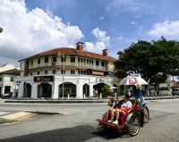 Mit der Rikschah kann man Georgetown prima erkunden