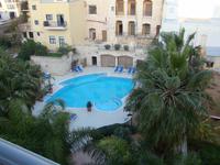 Hotelpool im Garten vom MARITIM Antoine Hotel & Spa Malta in Mellieha