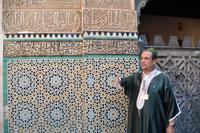 Mohammed vor Schriftzug