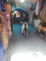 Mopedfahrer, Souk in Marrakesch