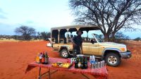 Pirschfahrt in der Kalahari - Sundowner open Bar