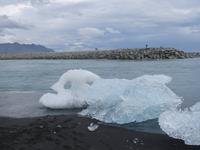 924 Island - Strand an der Mündung der Gletscherlagune Jökulsarlon im Meer -