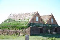 Häuser mit Torfdämmung am höchstgelegenen Bauerhof Islands