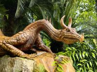 Hölzerner Drache im Flower Dome