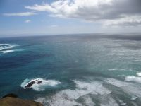 Cape Reinga, hier treffen das stürmische Tasmanische Meer (links) und der sanfte Pazifik zusammen. .