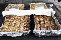 Traditionelles Hangi-Essen aus dem Erdofen