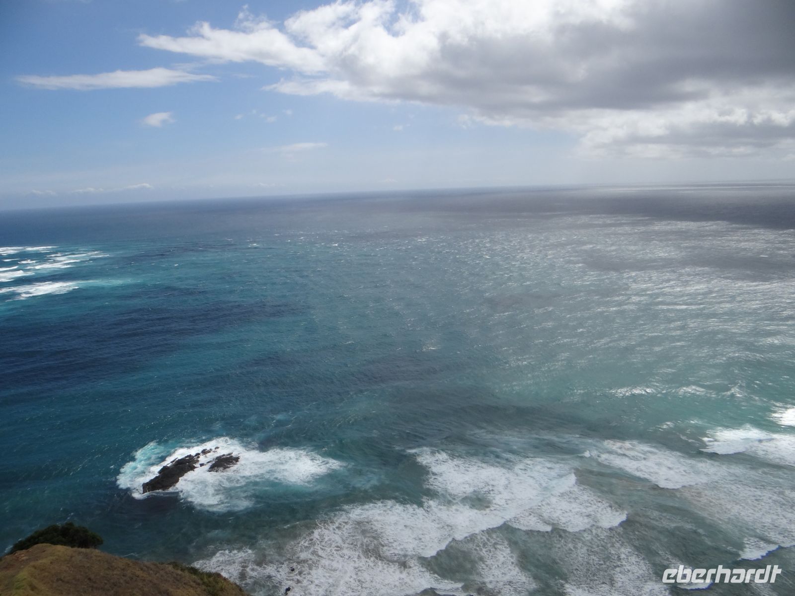 Cape Reinga, hier treffen das stürmische Tasmanische Meer (links) und der sanfte Pazifik zusammen. .