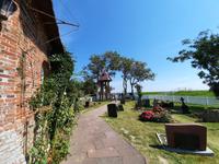 Rundreise Nordfriesland - Kirche auf der Kirchwarft auf Hallig Hooge