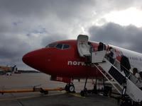 Hurtigrute, Flug mit Norwegian