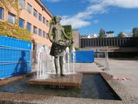 Kleine Rosenverkäuferin in Molde