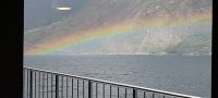 Regenbogen auf dem Fjord