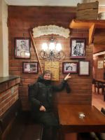 Norwegen - Tromso - Fotowand zur Geschichte der Olhallen.jpg