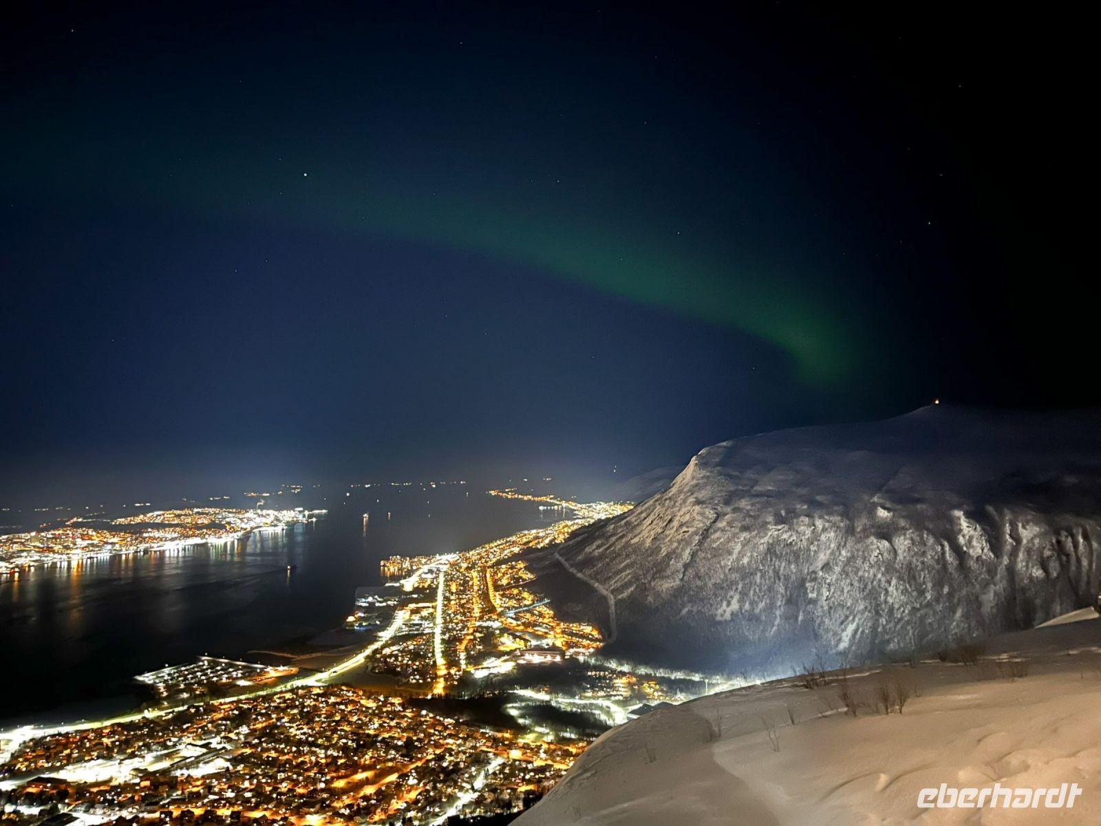 Nordlichter auf dem Fjellheisen mit Blick auf Tromsö