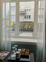 Ich kann aus den Zimmer direkt über die Zebrastreifen marschieren 