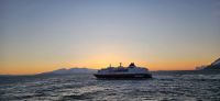 Begegnung mir MS Polarlys bei Sonnenuntergang
