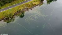 Das Lygnstøylvatnet - das aufgestaute Wasser überflutete die Siedlung, die noch heute unter Wasser zu sehen ist...Luftaufnahmen