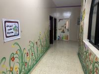 440 Women Association und Grundschule Taqa