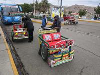 Mit Rikschas zum Hafen in Puno