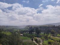 Zwischen aufreissenden Wolken sind die verschneiten Hänge des Misti zu erkennen &ndash; &copy; Andreas Böcker (Eberhardt TRAVEL)