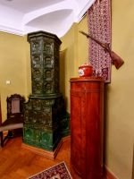 Kachelofen mit perspekivischen Kacheln um 1880