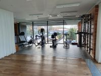 Fitnessbereich im Shuum-Hotel