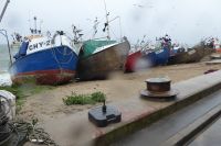 Fischerboot am Strand von Chlopy