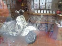 Porto (Roller mit Knöpfen besetzt)