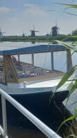 Mit dem Boot entlang der 19 Mühlen in Kinderdijk
