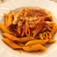 Begrüßung in Italien mit Nudelgericht