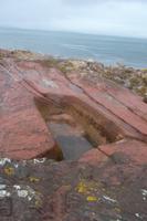 Sandsteinfelsküste im Nordosten von Arran