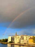 Stockholm. Regenbogen und Abendlicht