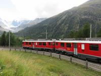 0191 Glacier-Bernina-Express-  Fahrt mit dem Bus über den Bernina-Pass - Blick zum Monteratsch-Gletscher mit Bernina-Express