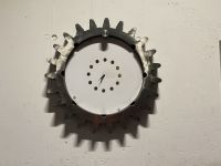 Zahnrad und Uhr