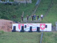 0011 Alphornbläser eröffnen den Nationalfeiertag auf dem Schanzentisch der Sprungschanze Engelberg