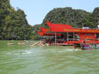 Chinesen beim Kanufahren