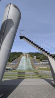 20260622_14 die Schanzen von Lillehammer mit dem olymp. Feuer.jpg &ndash; &copy; Michael Rass (Eberhardt TRAVEL)